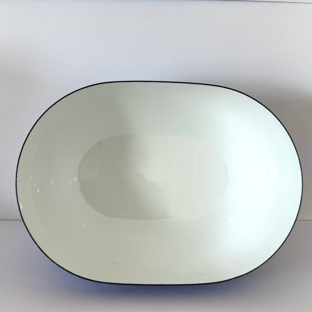 1960's MCM Blue Oval enamelware bowl with small white diamonds by Ampleur Ejiry in the style of Kai Franck Final Arabia,...
