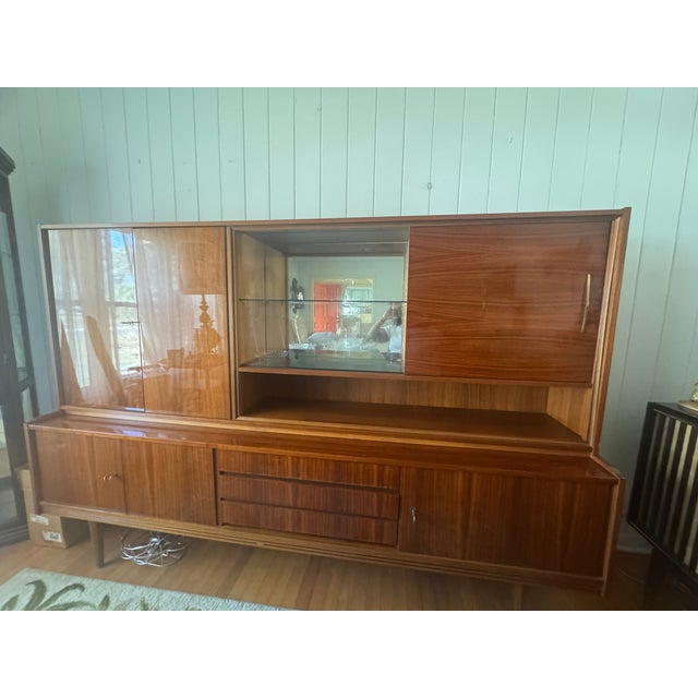 This beautiful China cabinet has been in our family since the late 50’s. It was purchased in Germany when our father was...