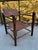 Vintage Safari Chairs Set of 4 – Brown Leather and Wood (1920s) Experience the timeless elegance of the 1920s with this...
