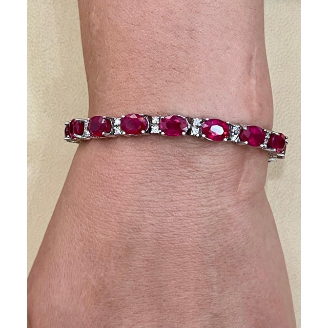 This exceptionally affordable Tennis bracelet has 16 stones of oval Treated Rubies . Ruby is Treated. The weight of the...
