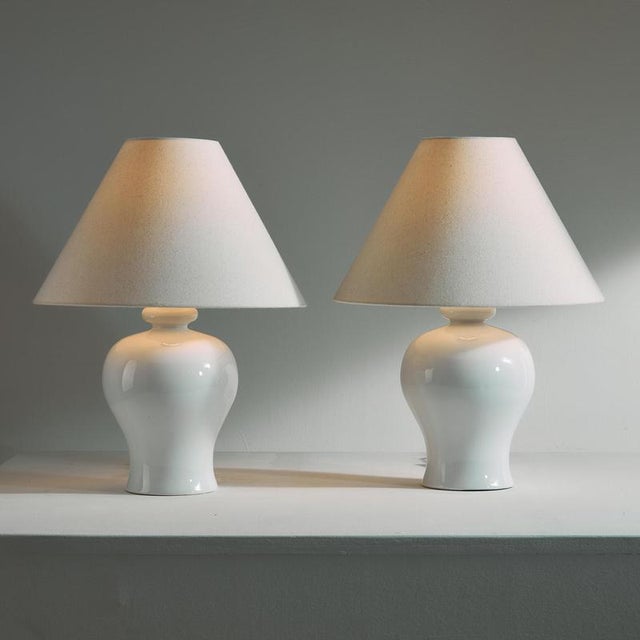 German ceramic table lamp with glossy glaze from the 1970s. In good condition with a new beige textile lampshade. Up to...