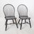 An elegant set of four Windsor Bowback side chairs by the legendary American craftsman D.R. Dimes. Finished in a black...