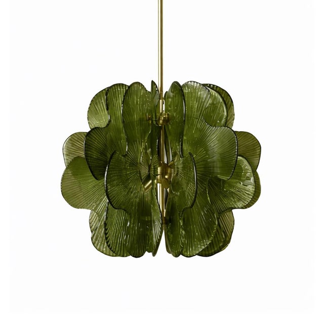 This pair of suspension lights features a brass structure from which multiple Murano glass slabs are suspended, arranged...