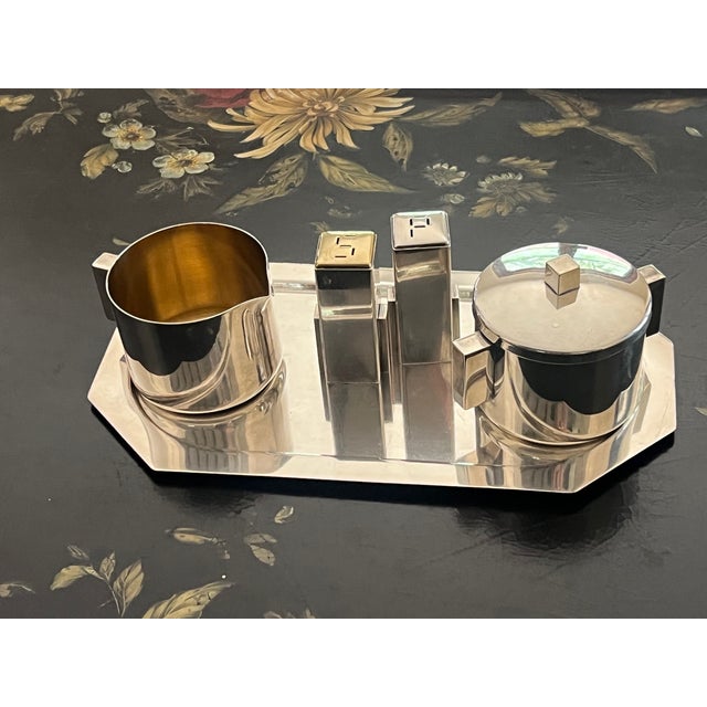 Six piece American Art Deco set made by Merle F. Faber in the mid century. The skyscraper design set consists of a tray,...