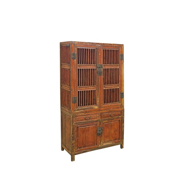 This vintage Oriental storage bookcase exudes a rustic, time-worn elegance, finished in a deep reddish-brown lacquer that...