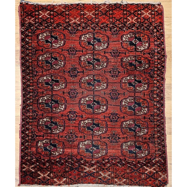 2’ 10” x 3’ 7” Vintage Turkmen Tekke area rug in an allover small medallion pattern from the late 19th century. The rug...