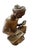 A delightful pair of hand-carved vintage figurines depicting seated scholars engaged in study and calculation. One figure...