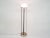 Stone foot with iron pillar which hold the milk glass lamp shade Up to 250V (Europe/UK Standard).The wiring of this item...