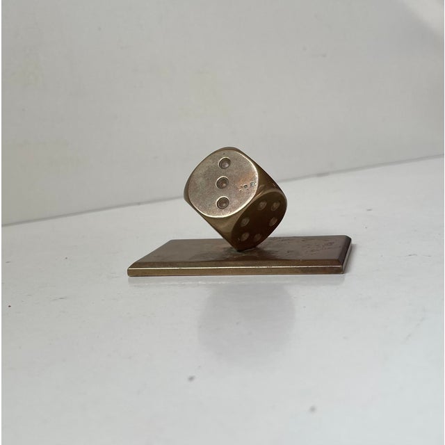 Small and stylish desk sculpture or paperweight. Despite its smaller size it is rather heavy. It was made in Scandinavia...