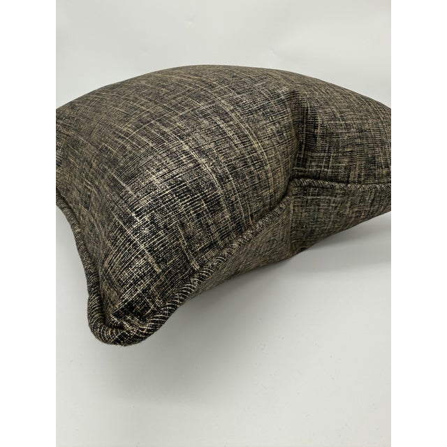 Decorative throw pillow cover crafted from a high-end upholstery fabric featuring a sophisticated crosshatch weave....