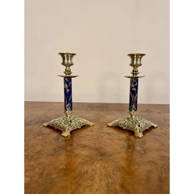 Unusual quality pair of antique Victorian brass & porcelain candlesticks, having a quality ornate brass top above a square...