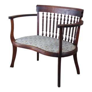 Early 1900s Antique Edwardian Mahogany Spindled Barrel Back Kidney Shaped Floral Seat Settee For Sale
