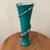 This vintage deep teal Murano studio art glass trumpet vase features a spiraling accent and is signed by the artist....
