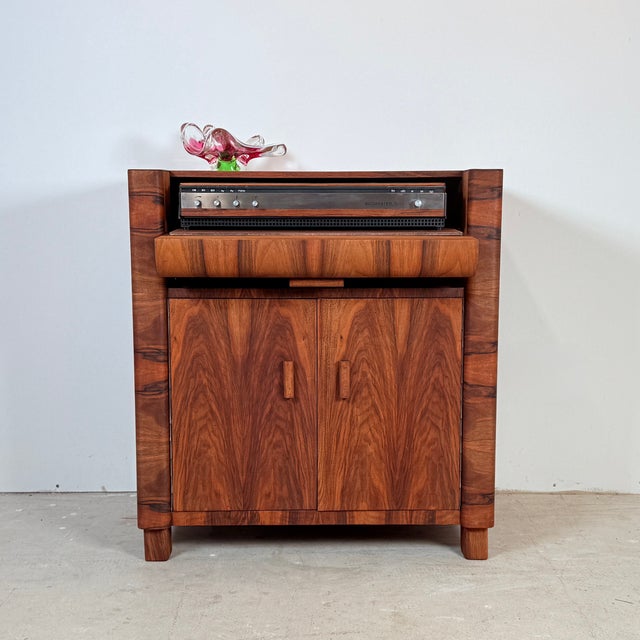 This unique audio cabinet dates back to the 1950s and was produced by Up Závody in the former Czechoslovakia. It stands...