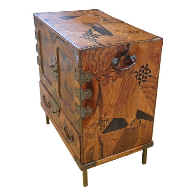 Wonderful Raised Japanese Cabinet Crafted With Geometrically Intricate Inlayed Wood and Hand Wrought Hardware For Sale