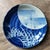 Large blue and white Japanese porcelain charger plate. Has raised edges with slight scalloping. Plate features an image of...