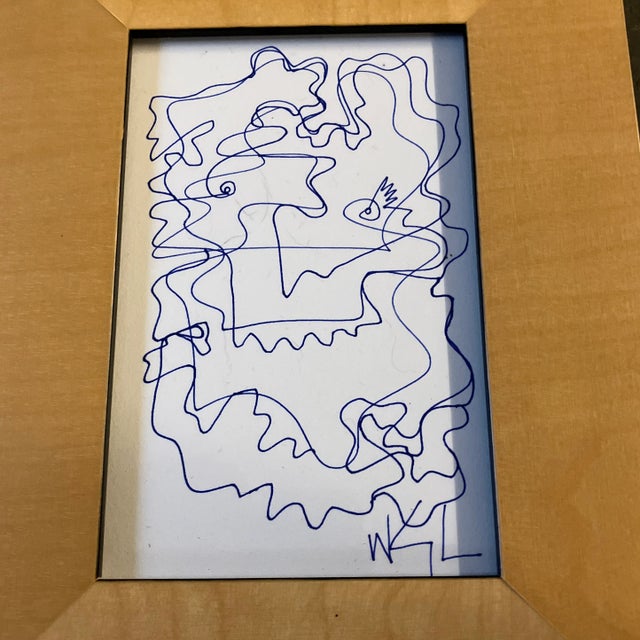 Original 4 x 6 blue ink drawing on paper signed bottom right Overall size with tabletop wood frame is 7 x 9