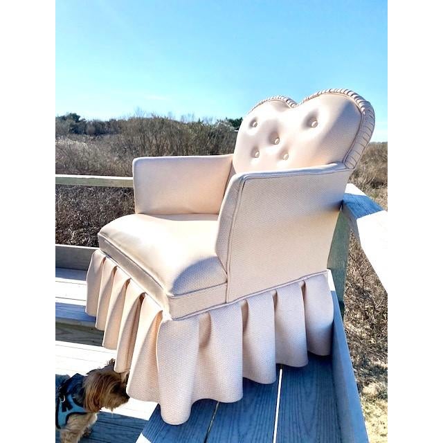 Heart Shaped Upholstered Chair in Pink and Ivory Circa 1950s Featuring a curved heart-shaped backrest upholstered in a...