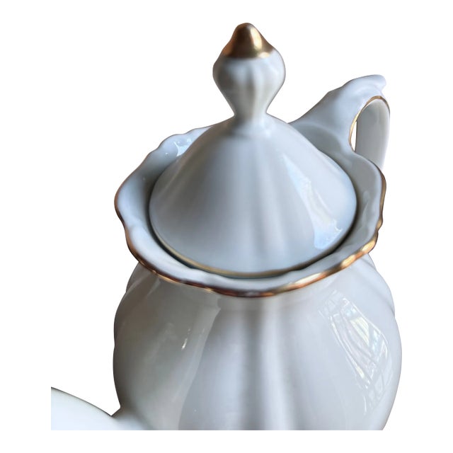 Mid-20th century three-piece porcelain coffee set in the Theresia pattern by Seltmann Weiden, produced in Bavaria,...