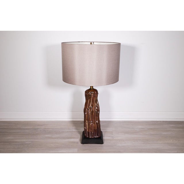 A beautiful pair of ceramicist John Glick's lamps. In good vintage condition. Dimensions: Bases: 7.5" x 7.5" & 6.5" x 6.5"...