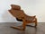 Kroken teak and brown leather lounge chair by Ake Fribytter for Nelo in good vintage condition. Patinated leather, small...