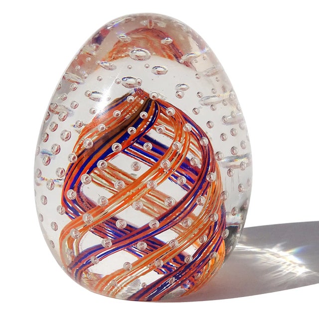 Beautiful and colorful vintage Murano hand blown blue, orange, white and bubbles Italian art glass egg shaped paperweight....