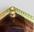 Sophisticated French Louis XVI style lacquered wood corner table with intricate brass metalwork sides. Three turned brass...