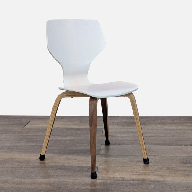 Molded plywood seat with tapered wood legs. Brand: Room & Board. Original Price: $229. Dimensions (in): 18W x 20D x 34H.