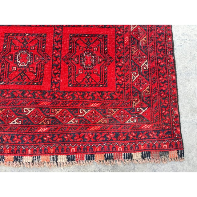 The Afghan Turkoman Vintage rug is hand-knotted and 100% wool, This Afghan Turkoman rug will enhance your home's style....