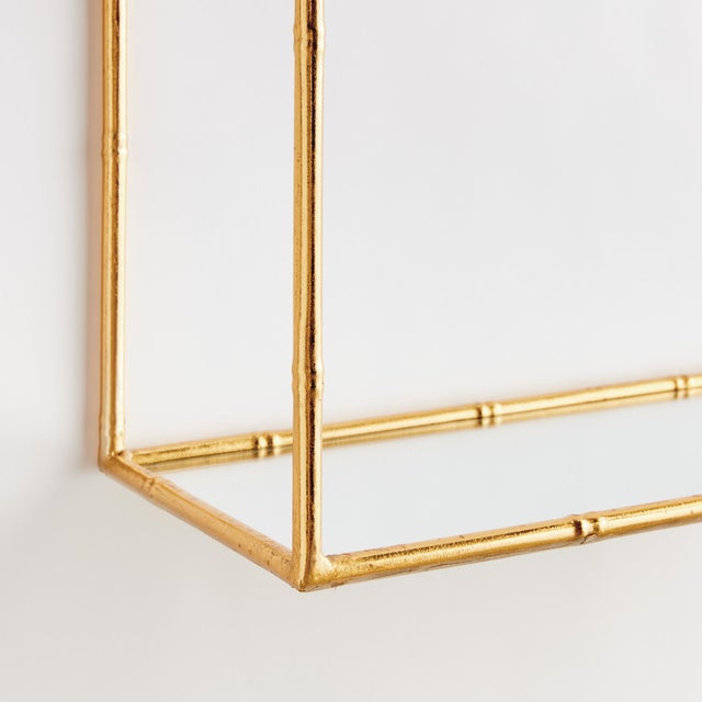 This set of mirrored wall shelves are a contemporary take on chinoiserie style. Smooth and refined, they are scaled to...