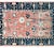 This vintage Indian wool rug, hand-knotted in the late 20th century, draws inspiration from the classic Persian Sarouk...