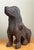 This vintage hand-carved wood dog sculpture beautifully captures the loyal spirit and graceful posture of a canine through...