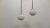 Pair of Mid-Century Modern Snow Ball pendant Lights with bubble texture. Frosted white molded glass snow ball pendants,...