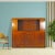 This Chinese antique display cabinet stands 59.5 inches tall and features a hand-painted cabinet. The cabinet is made of...