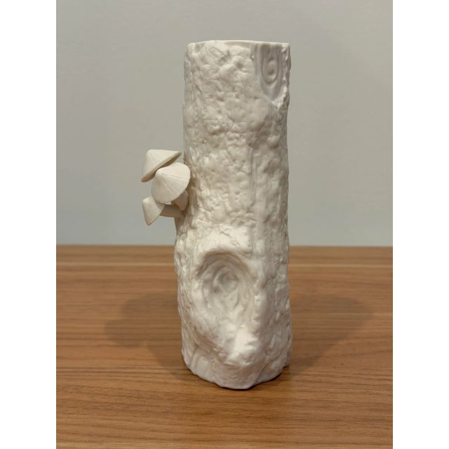 The Branch Vases, which come in a smaller and larger size, and are fanciful and resemble tree trunks with all the growths...