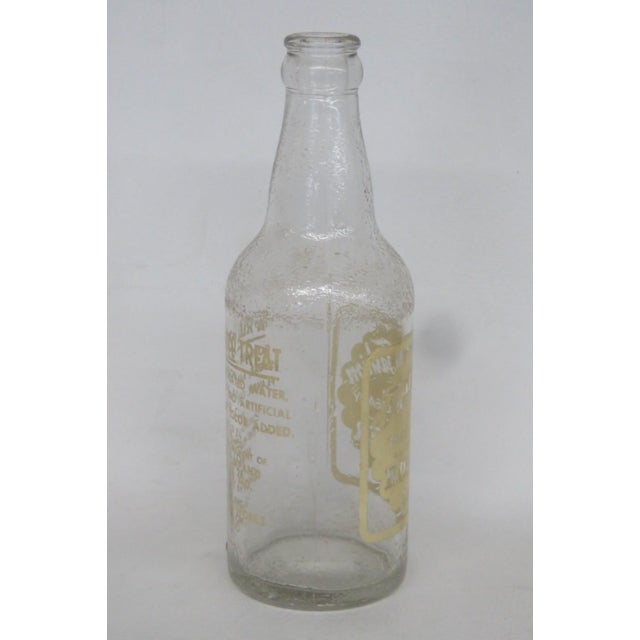 This gorgeous Empty Soda Bottle is made of glass. This beautiful vintage bottle was made by Frostie Old Fashion in the...