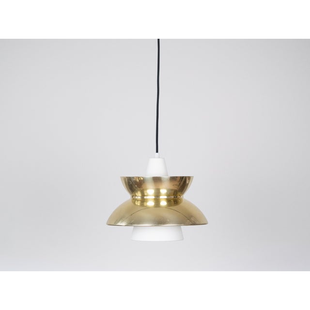The Doo-Wop pendant lamp is a timeless design from the 1950s, created in collaboration with the Danish Navy. Initially...
