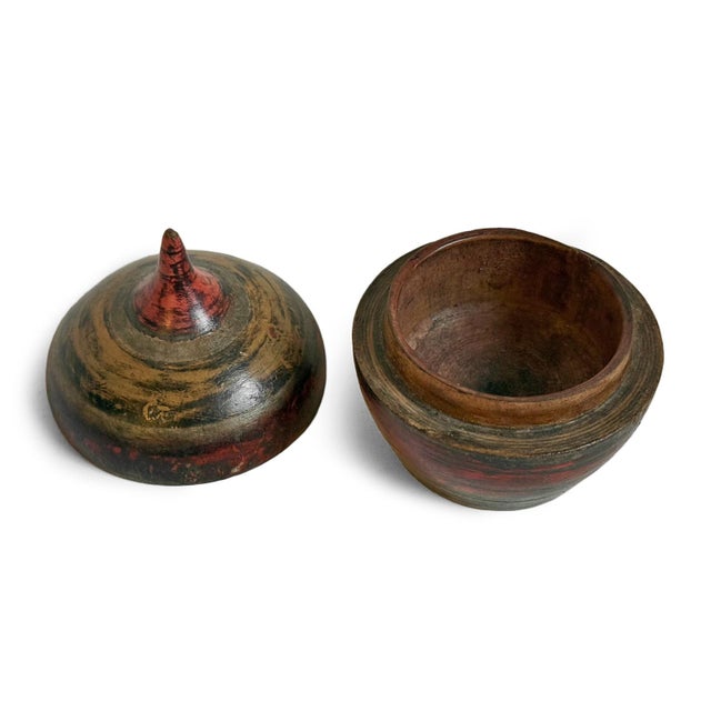 Authentic vintage wood tikka box from India painted with traditional ring designs. Beautiful worn patina. These beautiful...