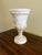 An elegant antique marble urn vase with beautifully softened veining and a restrained neoclassical silhouette. Carved from...