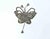Butterfly-shaped brooch is a handmade object realized in the 1930s. Craftmanship, 17 x 12 cm. Some stones are missing and...