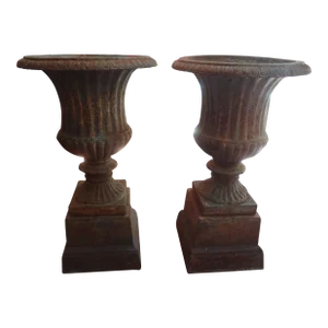 Pair of 19th Century French Neoclassical Style Iron Urns on Plinths