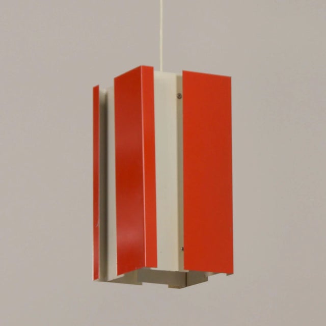 Anvia hanging lamp model 4101 designed by J.J.M. Hoogervorst for Anvia in 1964. Due to the special construction, this...