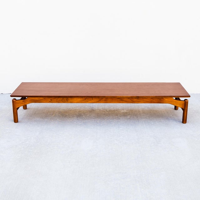 Expertly restored walnut bench by Greta Grossman, made by Glenn of California in the 1950s. A versatile piece that can be...