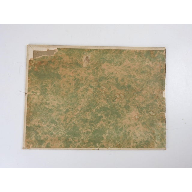 Early 20th century oil on canvas board winter landscape scene with snow covered cabins. Unsigned. Unframed, age darkening.