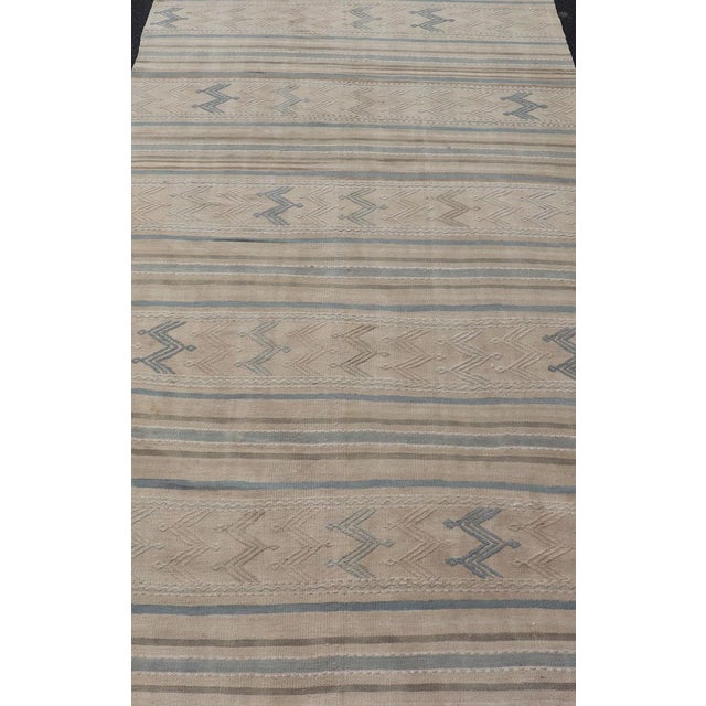 Turkish Vintage Kilim with embroidered motifs with light tan, blue, and brown. Vintage Kilim, Keivan Woven Arts / rug...