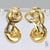 Here is a pair of 18k yellow gold "s" shaped latch back earrings. Total Weight - 7.03g