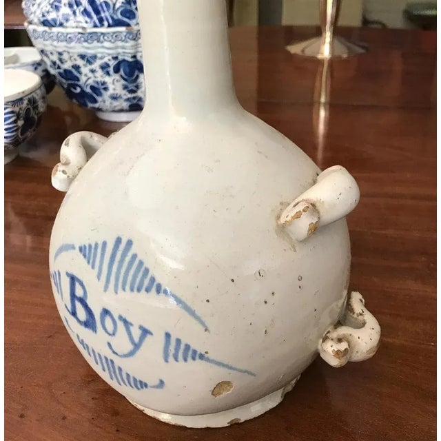 “Boy”. Comes from the french word boire and means drink It was supposed to have a leather belt for wearing 18 th century...