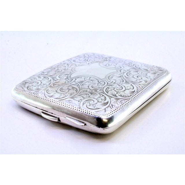 Silver Cigarette Case with Engraved Plant Motifs and Curved Monogram Card, in Very Good conditions. Designed 1890 to 1919...