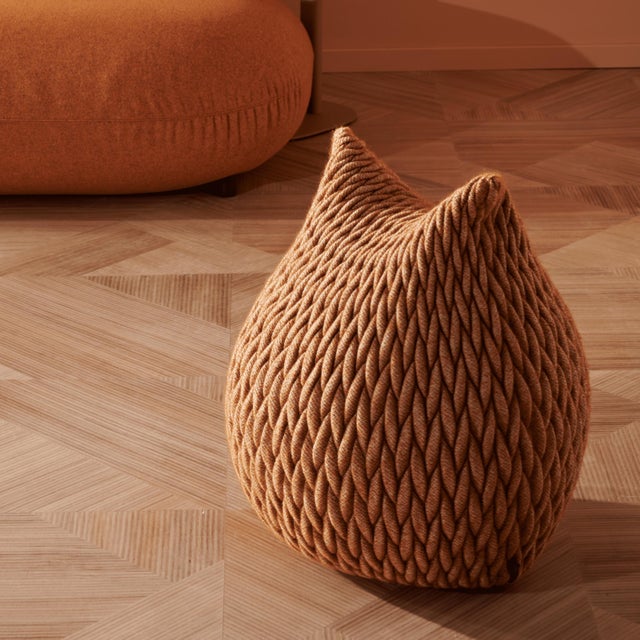 The pouffes are made in a three-dimensional elastic fabric and their shapes are highly flexible. They take the form of...