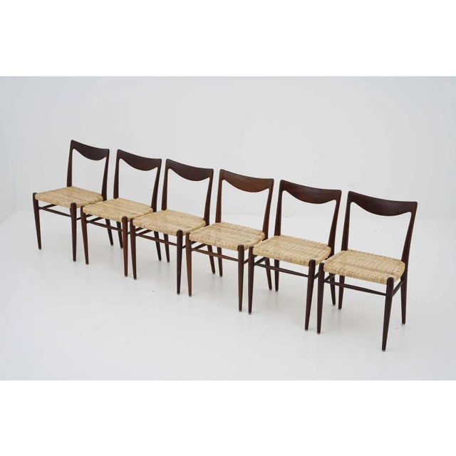 Scandinavian Mid-century dining chairs model "Bambi" by Rolf Rastad for Gustav Bahus, Norway. These sculptural chairs are...